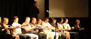 Subjects seated for an entertaining Hyptonsis demonstration